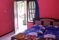 침실 2 Comfort Room at Omahe Toni