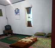 ห้องนอน 4 Comfy Room at Homestay Cemara Dieng Syariah 2