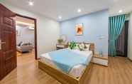 Kamar Tidur 4 Lily Hometel Centre Point