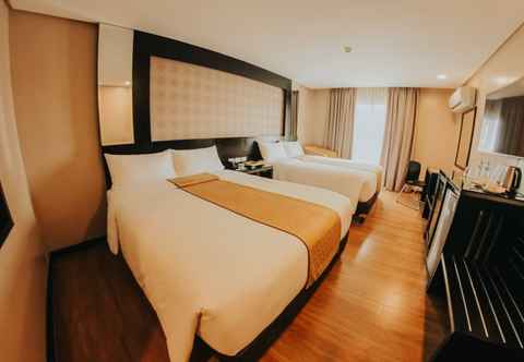 ห้องนอน Grand Xing Imperial Hotel