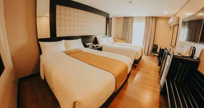 ห้องนอน Grand Xing Imperial Hotel