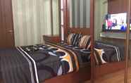 Bedroom 6 Apartemen Green Lake View By Hexa Room