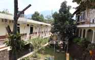 Exterior 5 Cozy Stay at Timlo Solo Guest House