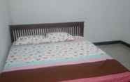 Bedroom 6 Budget Room at Homestay Manguntur