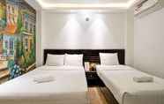 Bedroom 5 Lotus Laverne Hotel