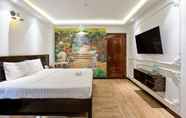 Kamar Tidur 4 Lotus Laverne Hotel