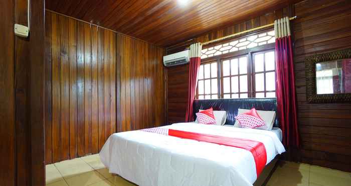 Phòng ngủ OYO 1254 Golden Lake Resort