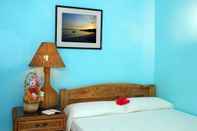 Bedroom Masamayor Beach House and Resort