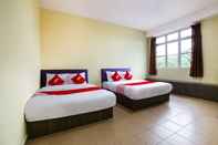 Phòng ngủ OYO 89585 Hotel Happy Inn