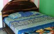 Kamar Tidur 2 Ekas Beach Homestay