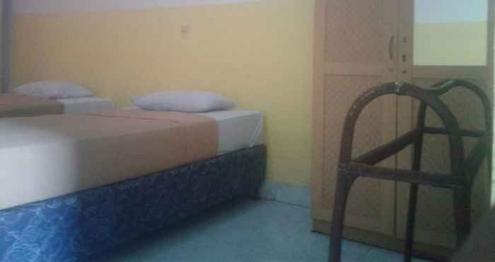 Bedroom Hotel Mawis Taliwang
