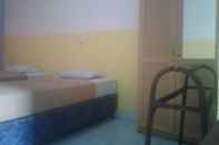 Bedroom Hotel Mawis Taliwang