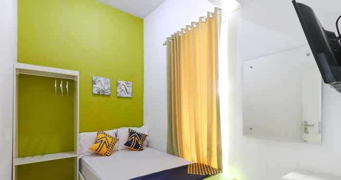 ห้องนอน SPOT ON 2332 D'green Homestay