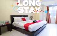 Bedroom 2 RedDoorz Plus @ Bienvenido Boarding House Las Pinas Weekly Stay