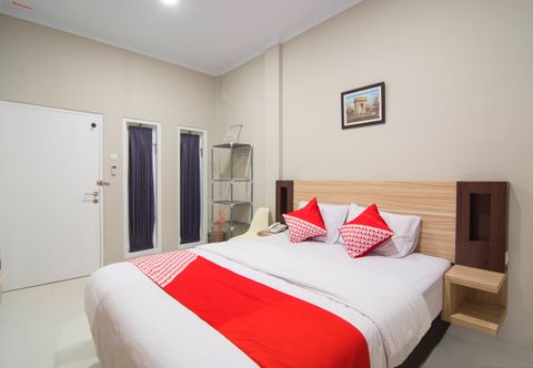 Bedroom OYO 195 Stay @h Guesthouse