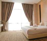 Kamar Tidur 4 Top Holiday Hotel