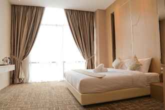 Kamar Tidur 4 Top Holiday Hotel