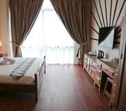 Kamar Tidur 7 Top Holiday Hotel