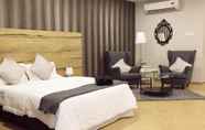 Bedroom 3 Grand Sri Lagenda Hotel