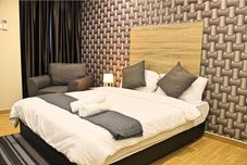 침실 Grand Sri Lagenda Hotel