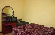 ห้องนอน 3 Affordable Room at Palem Homestay