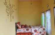 ห้องนอน 2 Affordable Room at Palem Homestay