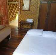 Bilik Tidur 4 Mbalata Beach Cottages