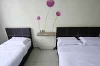 Kamar Tidur Max Inn Hotel