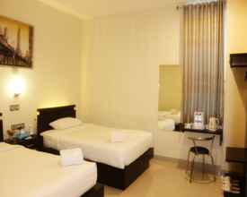 Kamar Tidur 4 Guardian Family Hotel