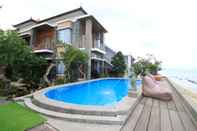 Bangunan Green Beach Inn