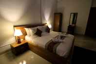 Kamar Tidur Green Beach Inn