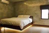 ห้องนอน Nai Suan Inn