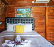 Kamar Tidur 6 Road Beach Homestay