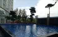 Swimming Pool 6 Cozy Stay at Apartment Grand Sungkono Lagoon (VIL)