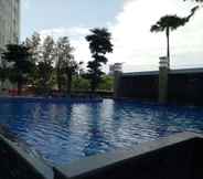 Swimming Pool 6 Cozy Stay at Apartment Grand Sungkono Lagoon (VIL)