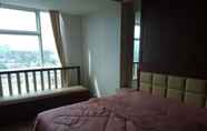 Bedroom 2 Cozy Stay at Apartment Grand Sungkono Lagoon (VIL)