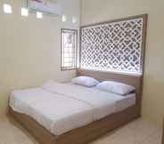 Bedroom 4 De Hanami Homestay Bondol