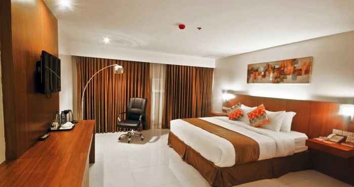 Kamar Tidur Chriscent Ville Hotel