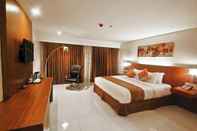 Kamar Tidur Chriscent Ville Hotel