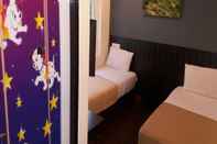 Kamar Tidur Hotel Pop Ash & Guesthouse