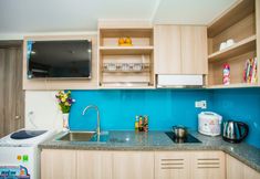 卧室 5 Moonlight Bay Hotel & Apartment