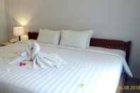 Bilik Tidur Dhyana Pura City Hotel 	