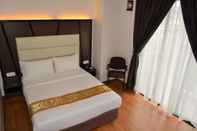 Kamar Tidur Hotel Grand Baron 