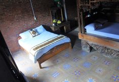 Bedroom 5 Wooden Room at Ndalem Malioboro Guest House