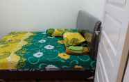 Kamar Tidur 6 Delima Guest House - 3 Bedrooms