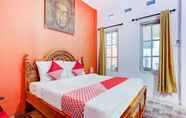 ห้องนอน 5 OYO 90363 Nira Guest House Sanur Bali