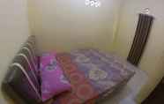 Kamar Tidur 7 Tomy Homestay