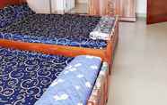 Kamar Tidur 2 Tu Quy Guesthouse