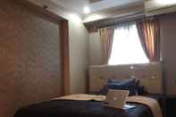 ห้องนอน Aura's Room at Apartment Mutiara Bekasi