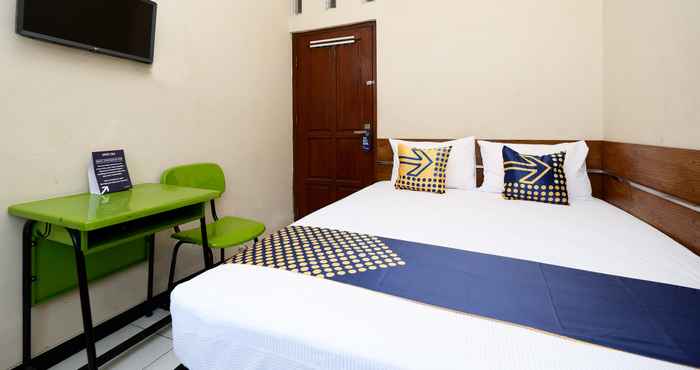 Kamar Tidur SUPER OYO 2209 Solo Point Guest House Syariah